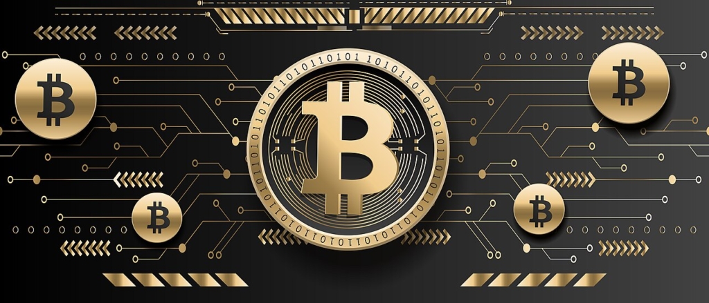 Bitcoin sembolü taşıyan altın renkli temsili madeni para